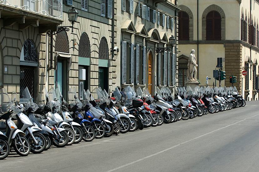 Row Of Vespas On Street In Florence